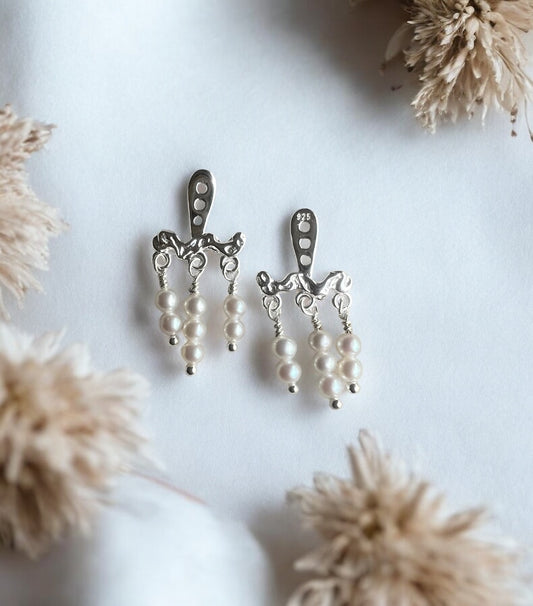 Clara behind ear, sølv